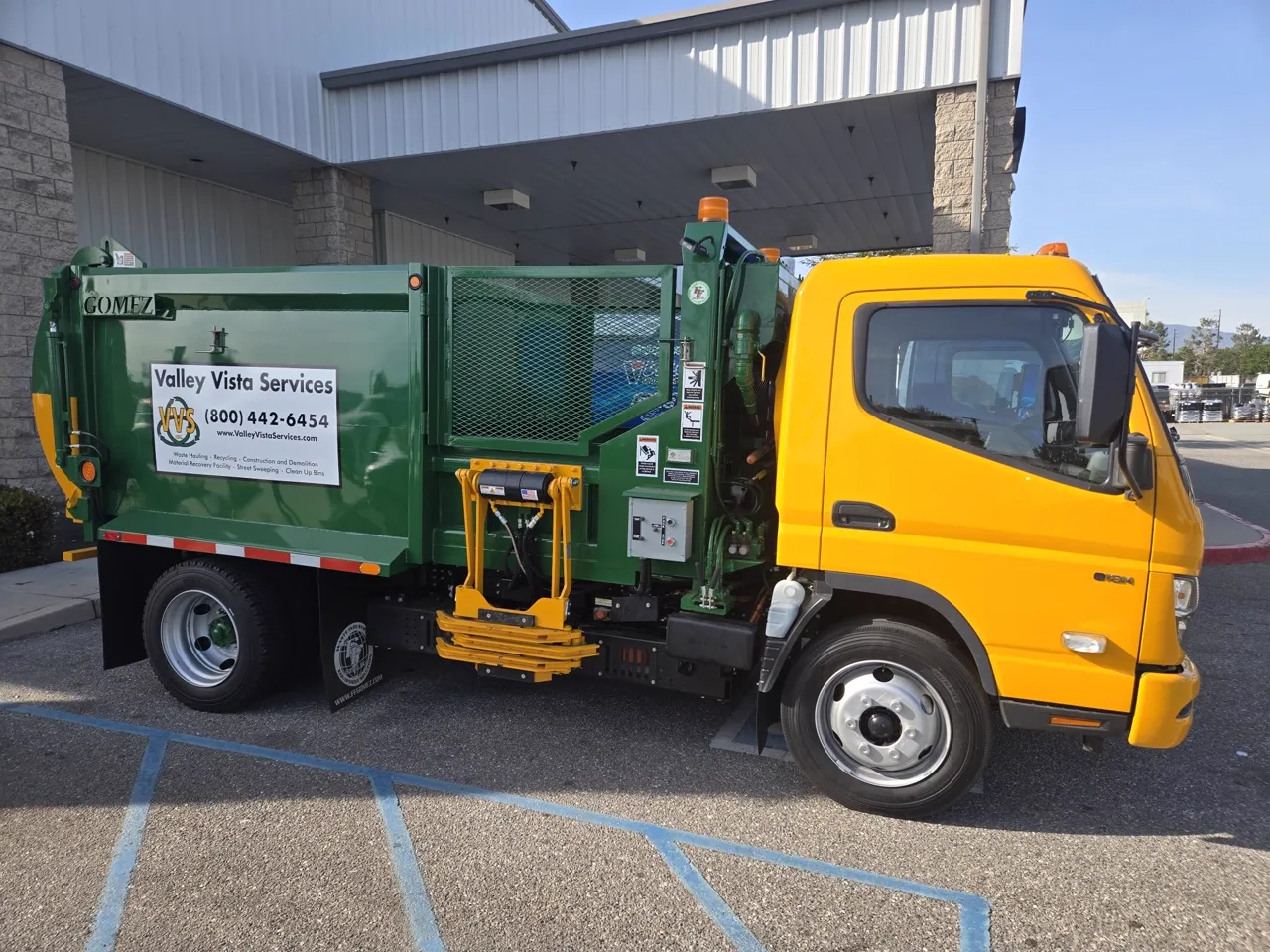 Valley Vista Services RIZON side-loading refuse truck