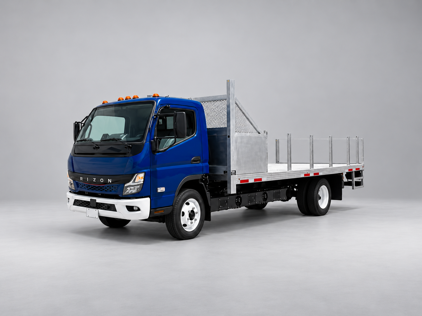 Blue RIZON bin hauler truck with a silver platform body and tall mesh headboard.