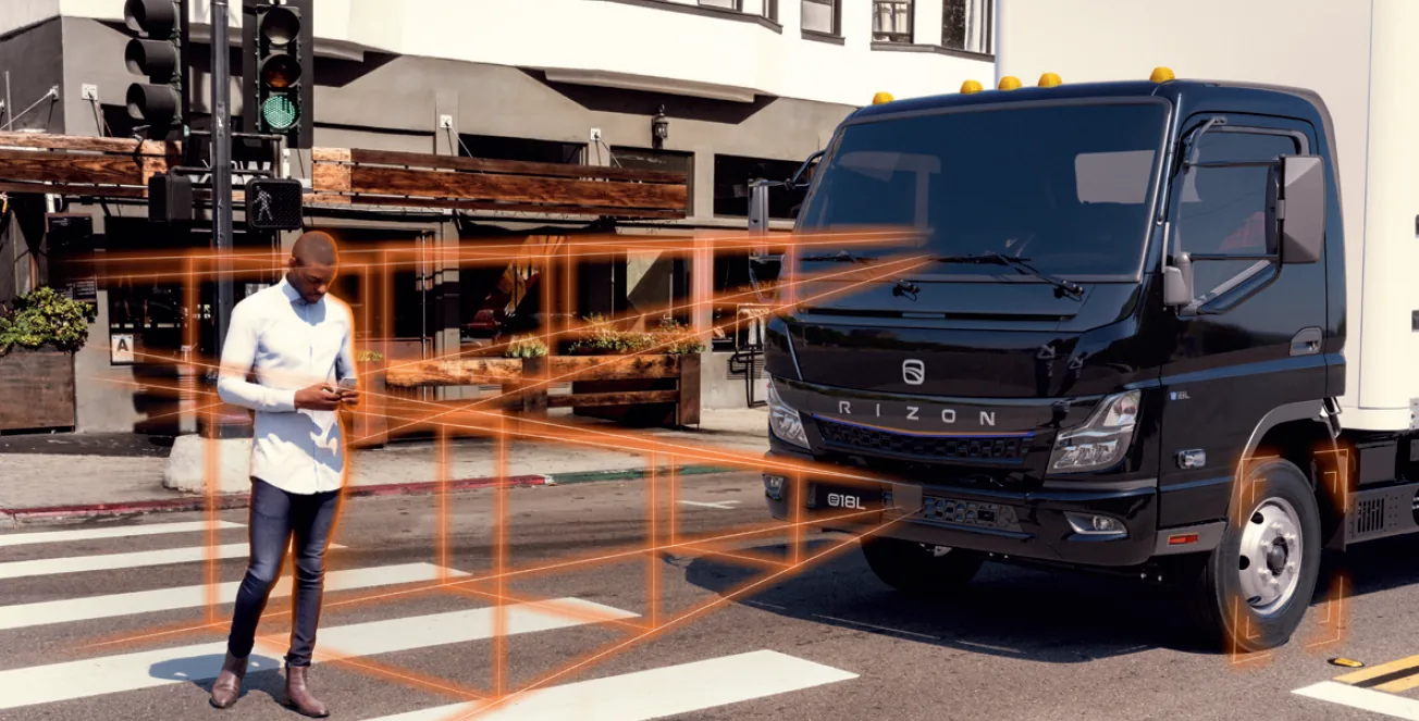 Rizon truck with driver-assist sensor visualization on an urban crosswalk